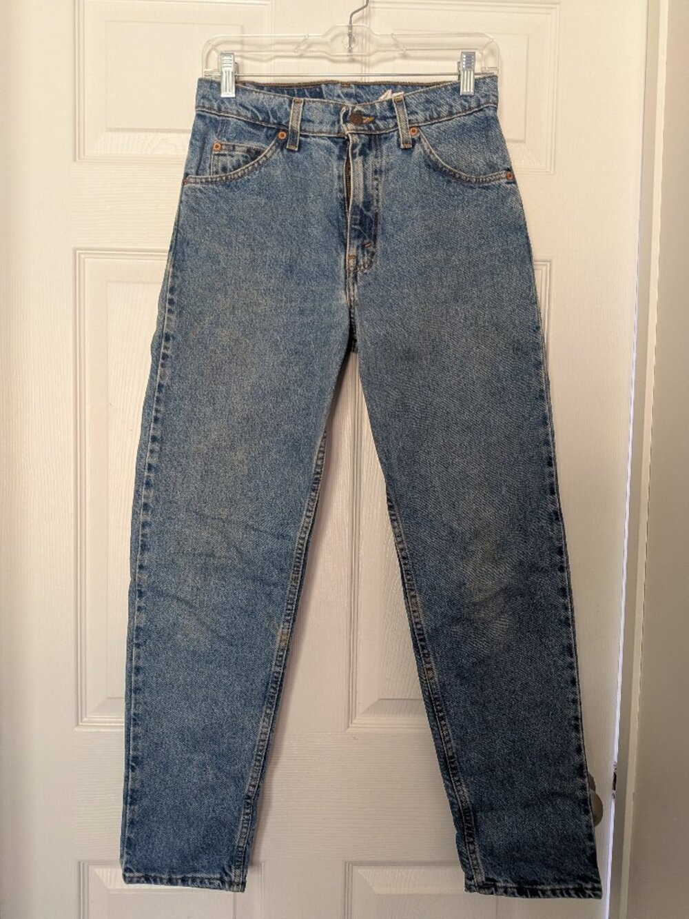 Vintage women's Levi's high waist orange tab